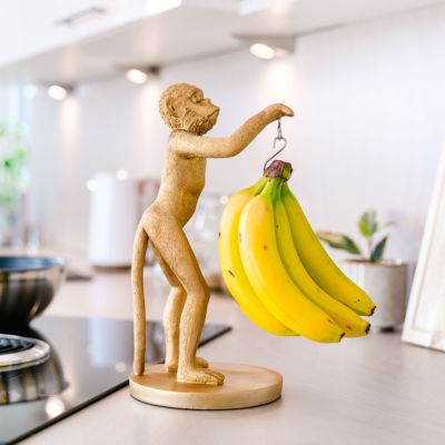 Gouden aap bananenhouder