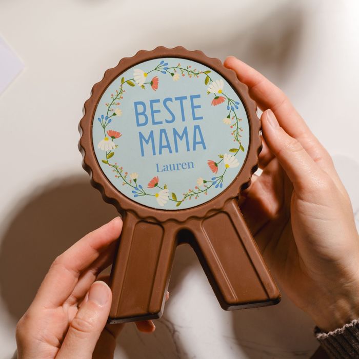 Gepersonaliseerde chocolade medaille met bloemen en tekst